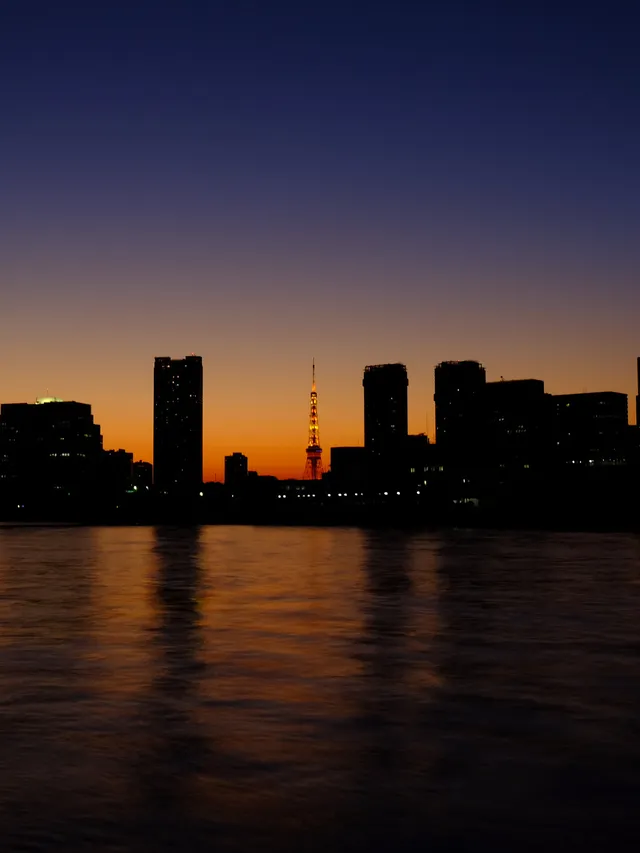 Tokyo Tower lit up at dusk