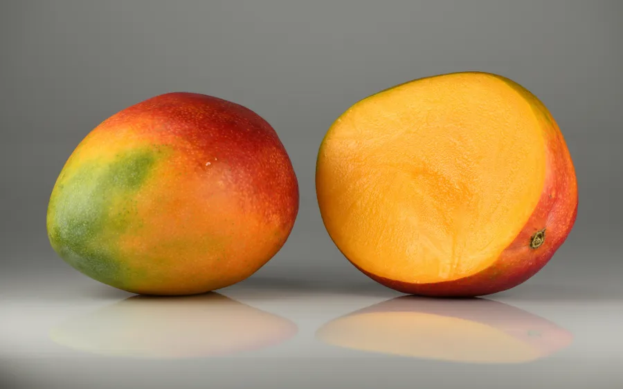 Mango, single and halved