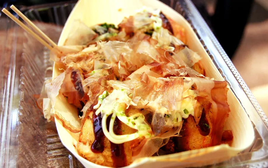Takoyaki served in a paper tray