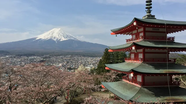 Mount Fuji framed by Chureito Pagoda and cherry blossoms